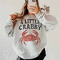 A LITTLE CRABBY OVERSIZED SWEATSHIRT
