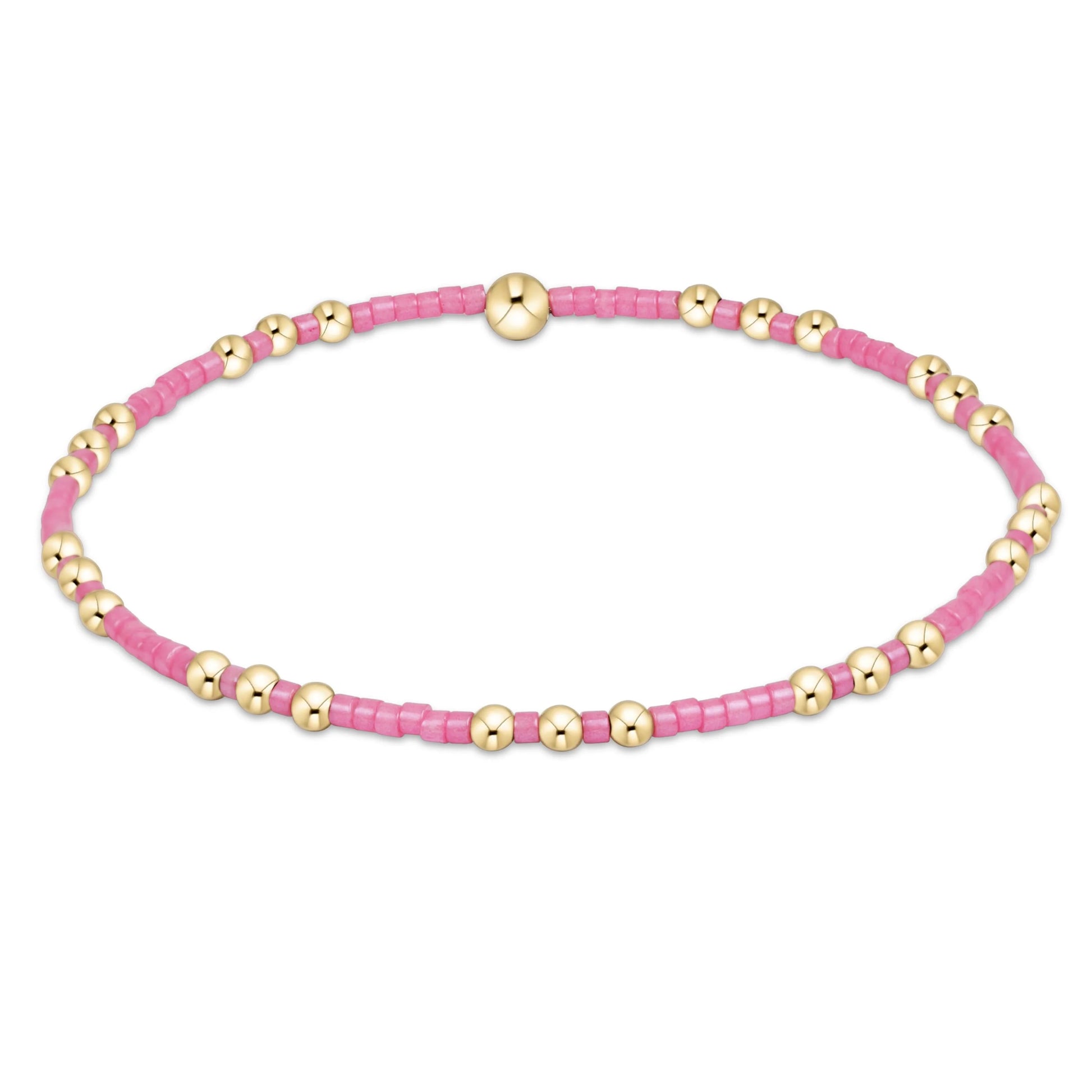 Pink beaded bracelet with gold accents on a white background